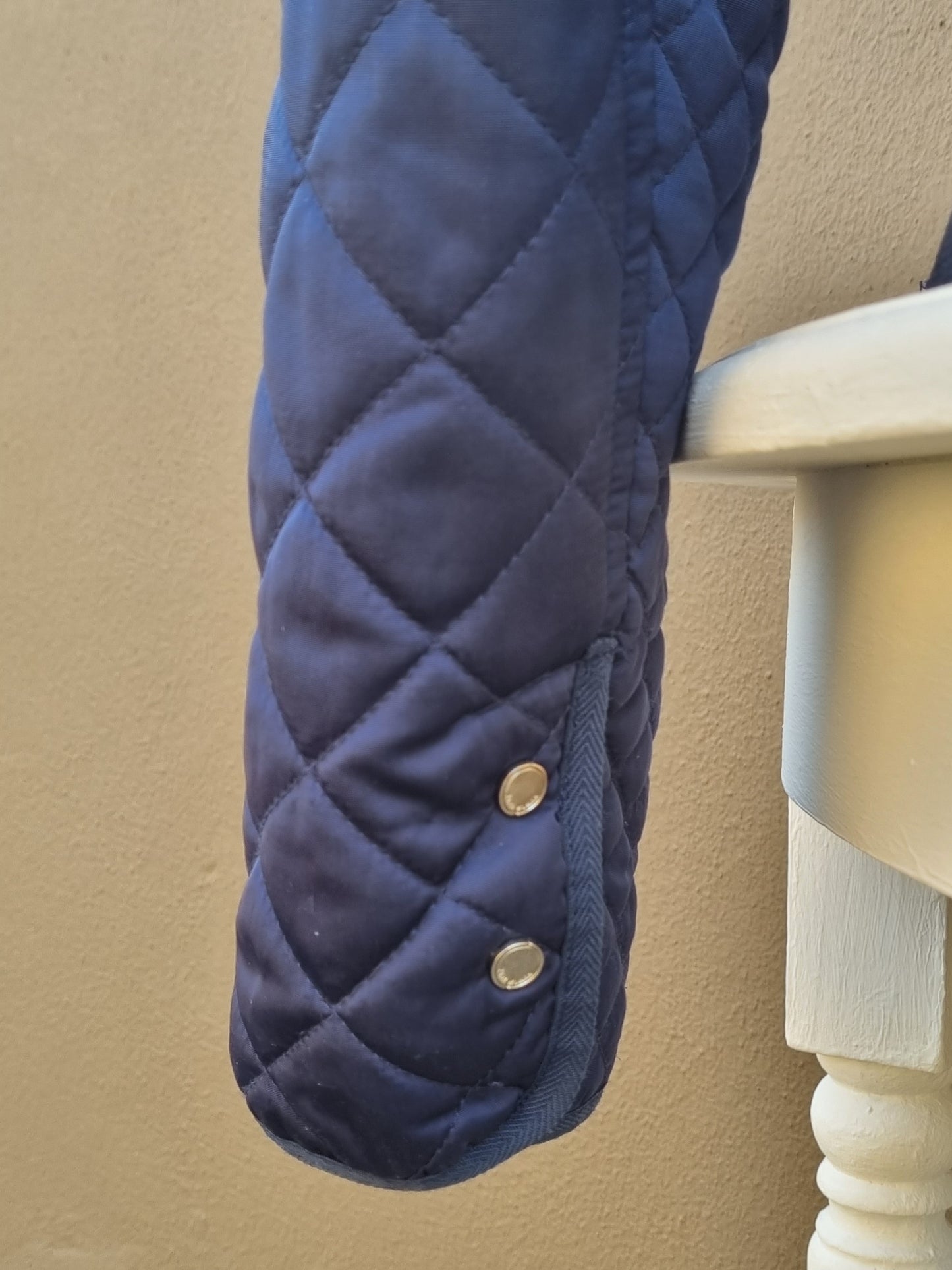 Zara Woman - Blue quilted mid waist jacket with front zip and size zip pockets