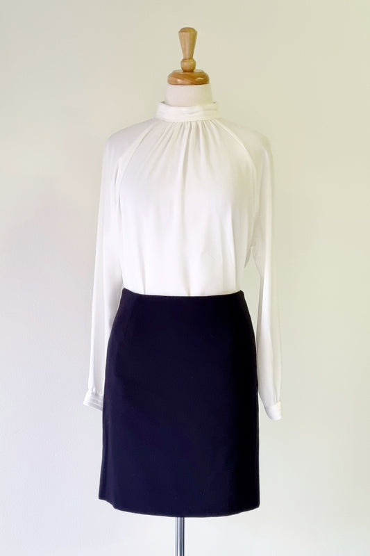 Charlotte - Black lined mini skirt with buttoned back slit