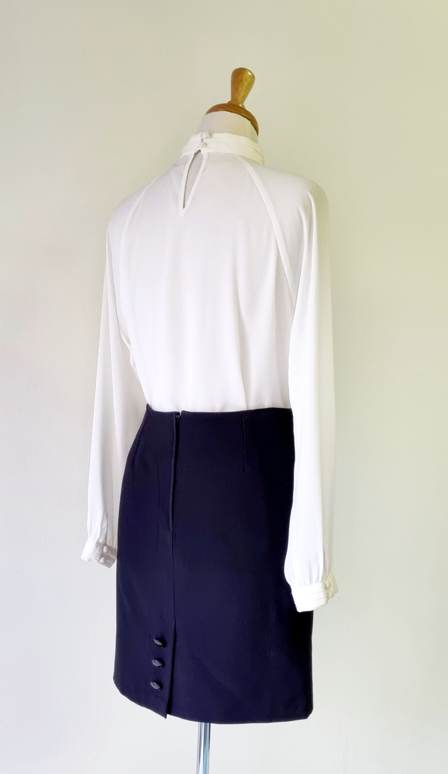 Charlotte - Black lined mini skirt with buttoned back slit