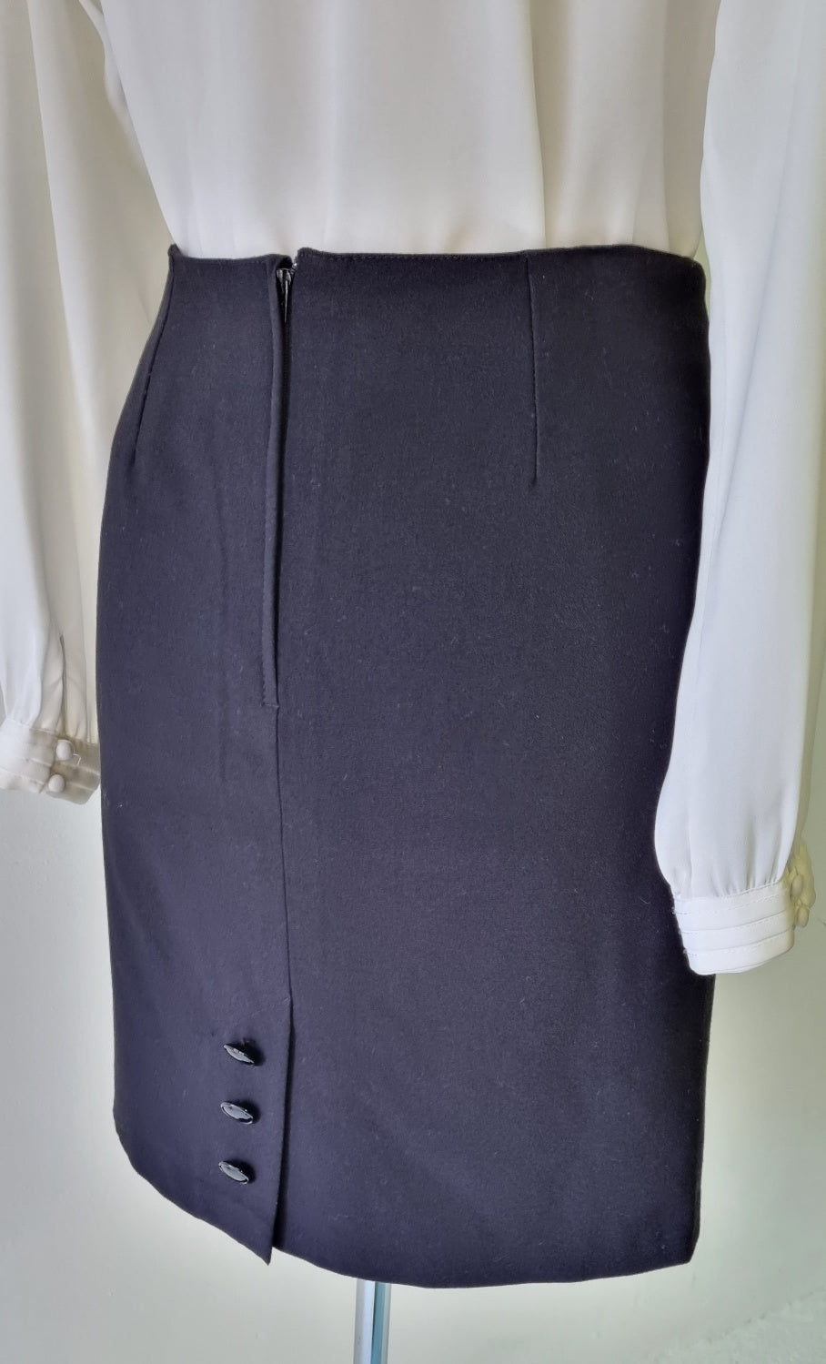 Charlotte - Black lined mini skirt with buttoned back slit