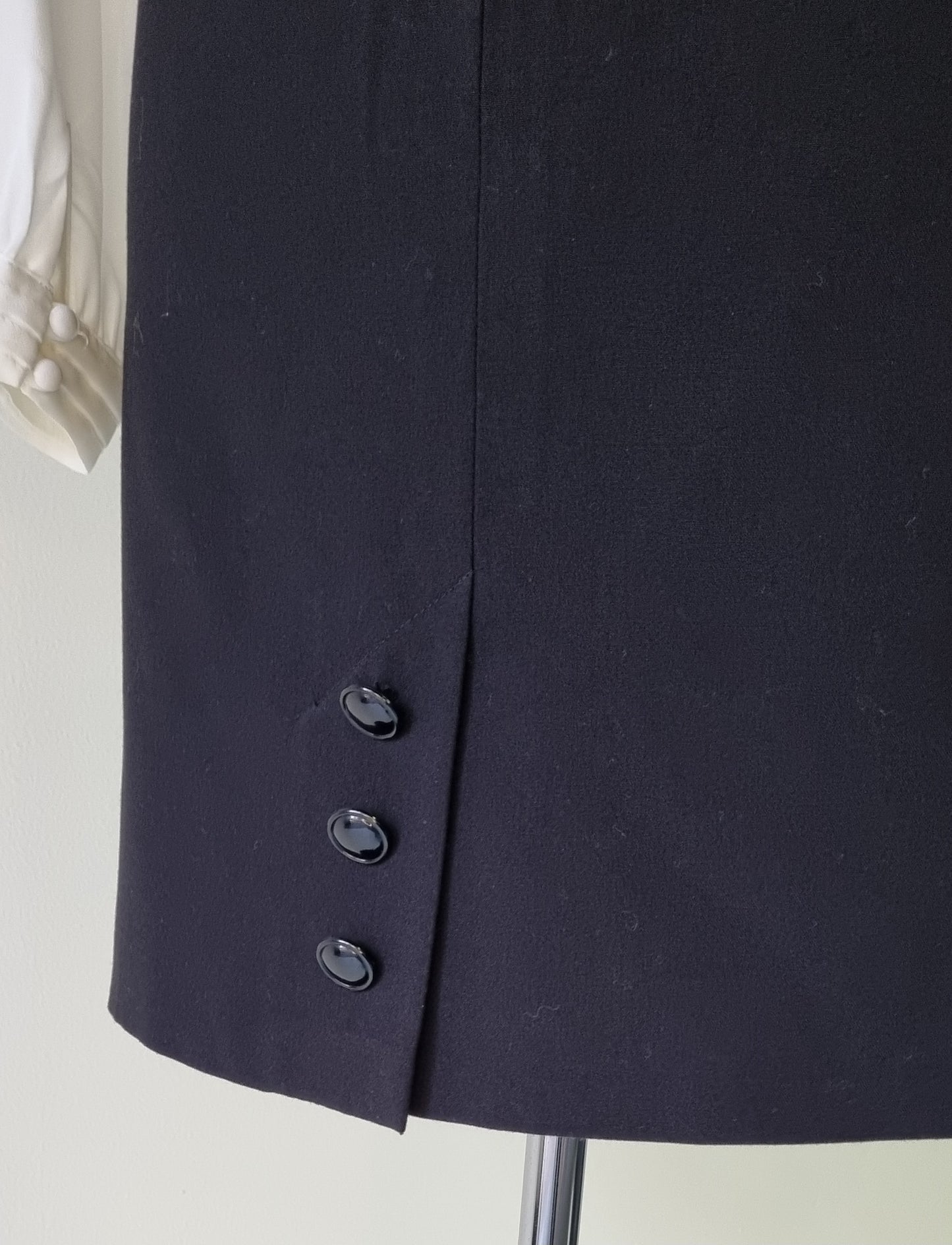 Charlotte - Black lined mini skirt with buttoned back slit