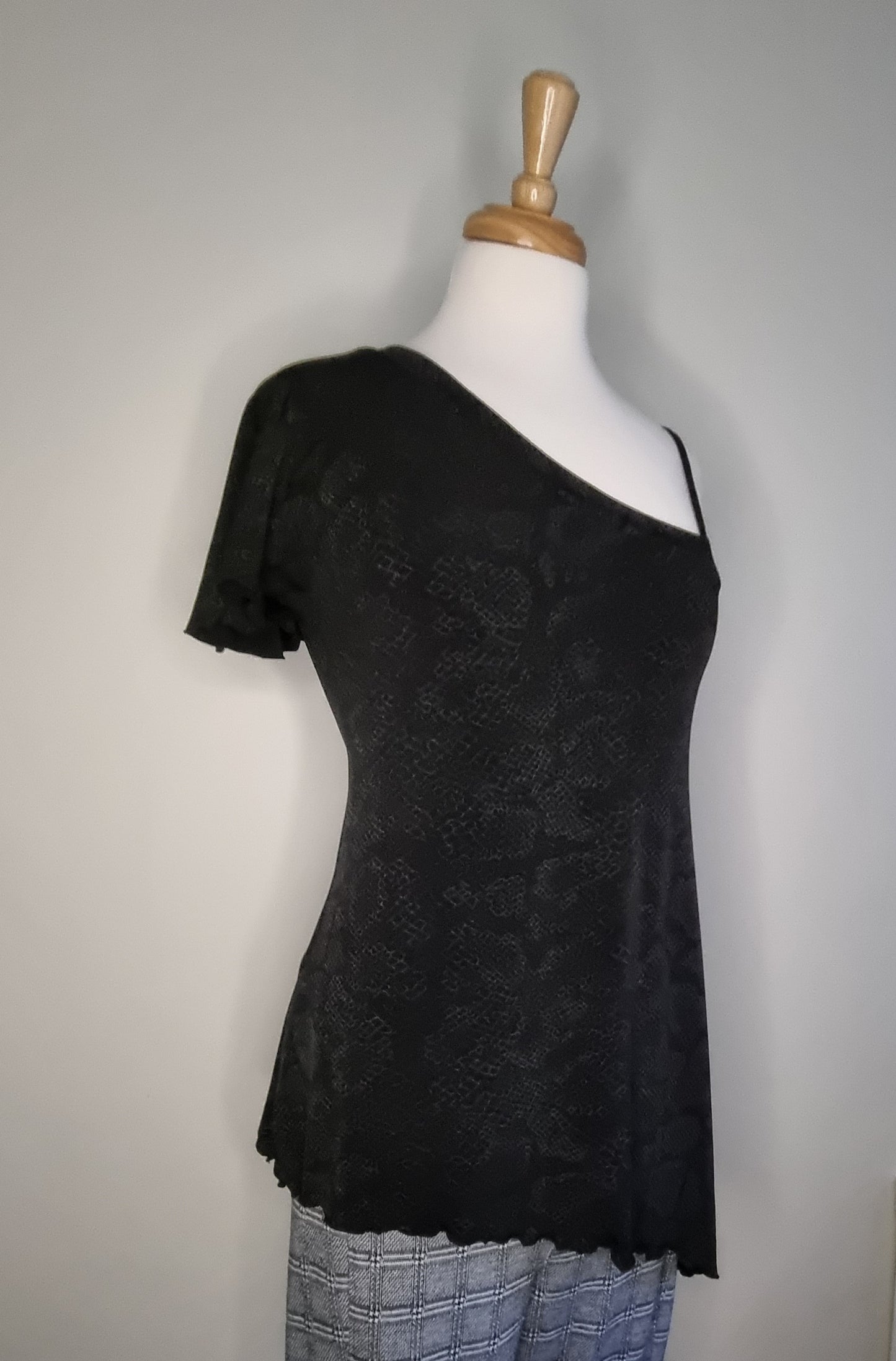 News - Black off shoulder blouse