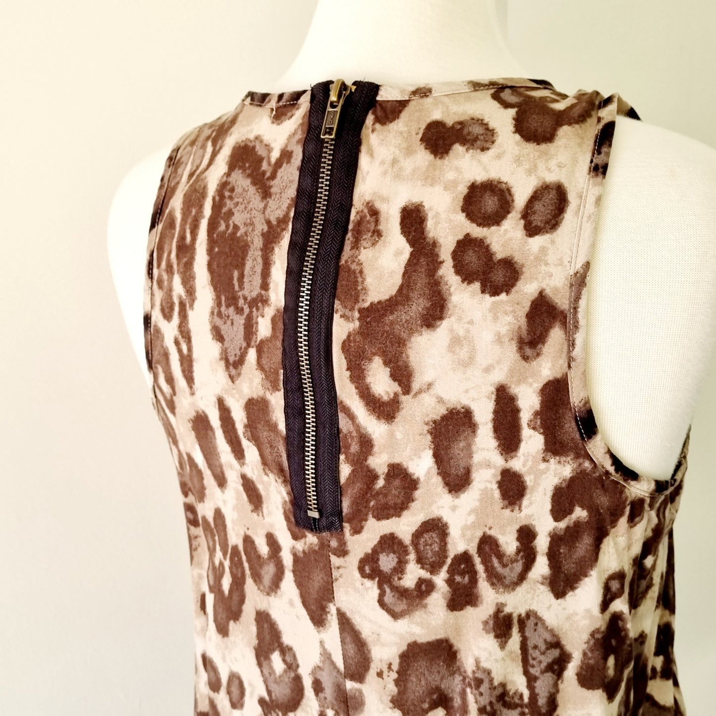 Milla - Brown & beige animal print sleeveless blouse with zip