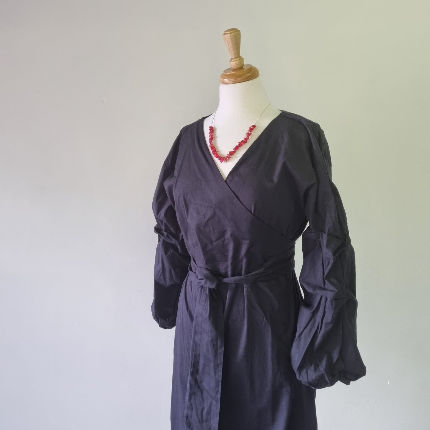 Style Republic - Unique black waisted long sleeve wrap dress