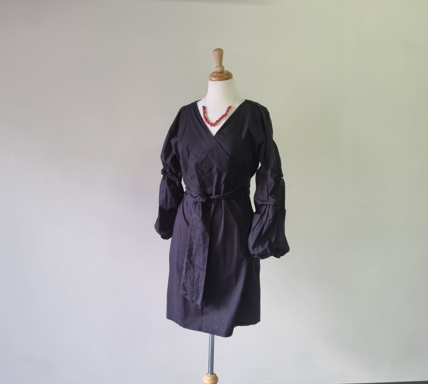 Style Republic - Unique black waisted long sleeve wrap dress