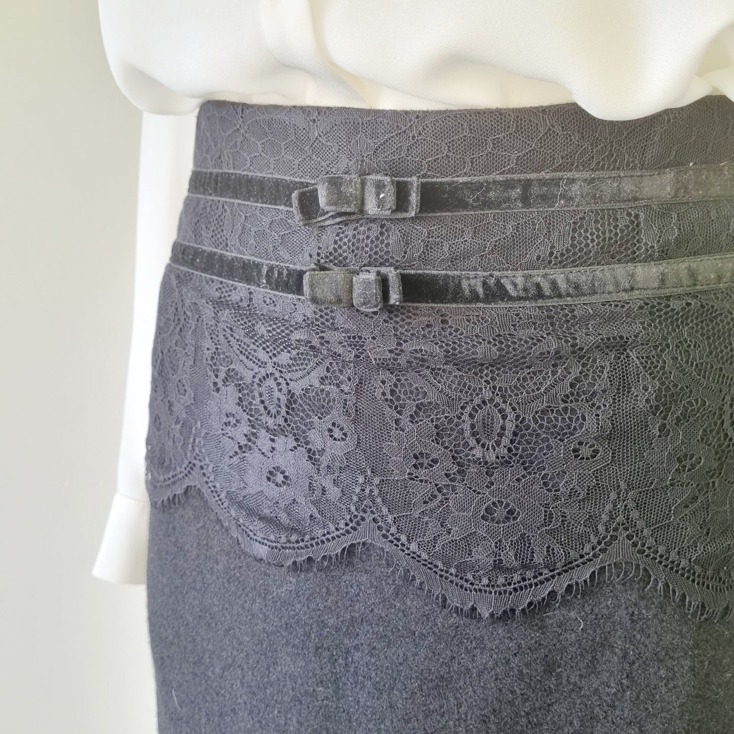 Jo Borkett - Black lined mini skirt with velvet bow trimmings