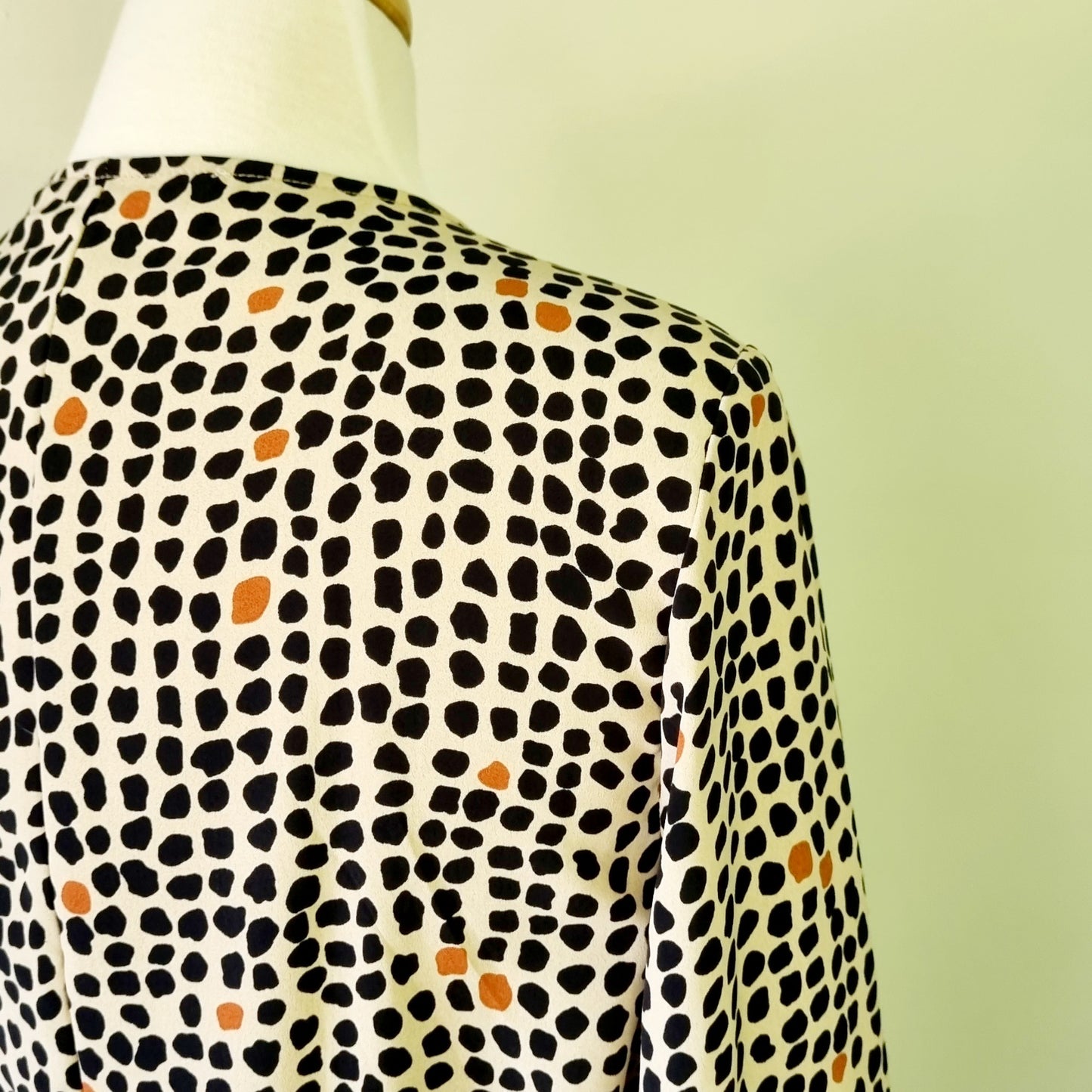 Real Woman - Black, beige & orange dotted print elastic waisted wrap dress.
