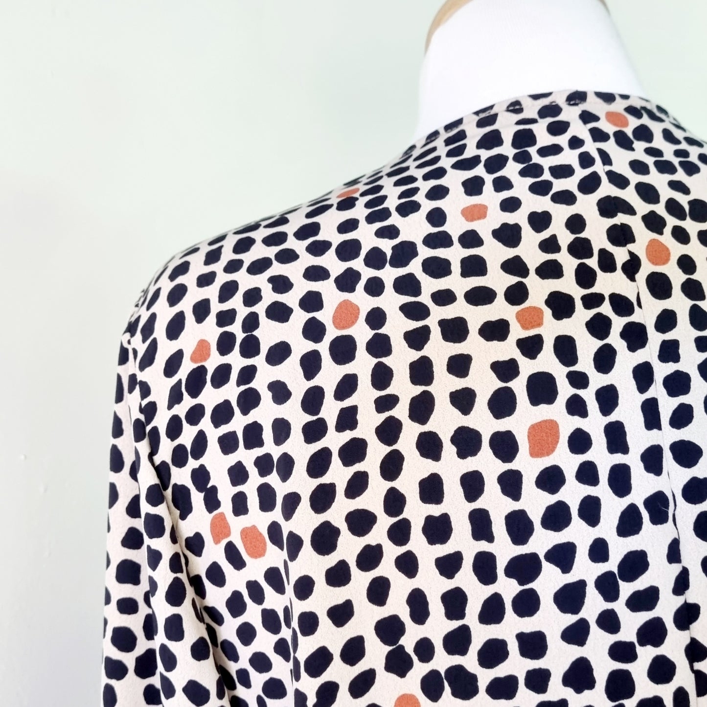 Real Woman - Black, beige & orange dotted print elastic waisted wrap dress.