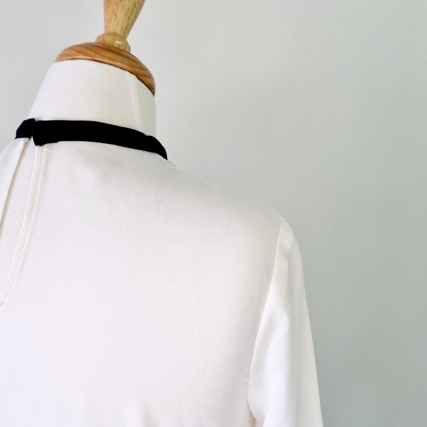 Zara Basic Collection - Off white long sleeve blouse with black embellished detail