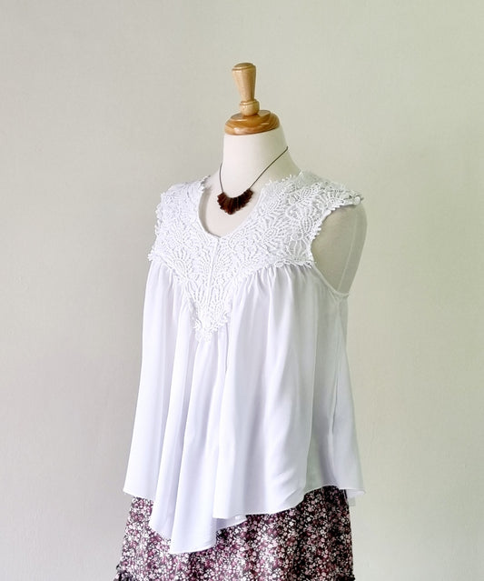 Le Chateau - White sleeveless high low smock blouse with crochet cotton bodice