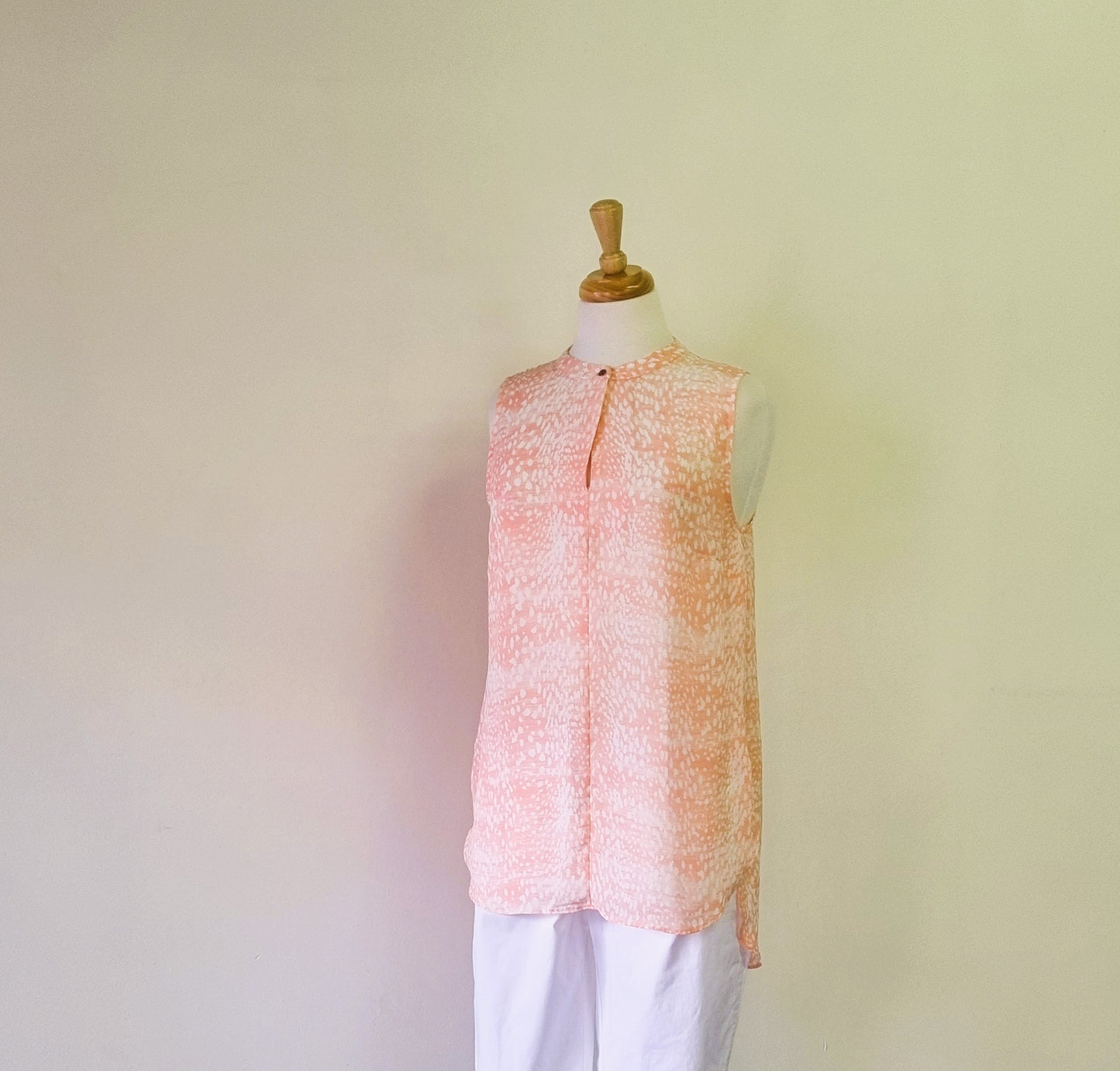 Woolworths - Fresh peach patterned round neckline hi lo sleeveless blouse with front fasterner