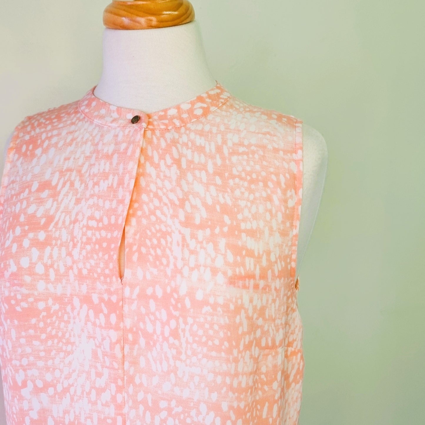 Woolworths - Fresh peach patterned round neckline hi lo sleeveless blouse with front fasterner