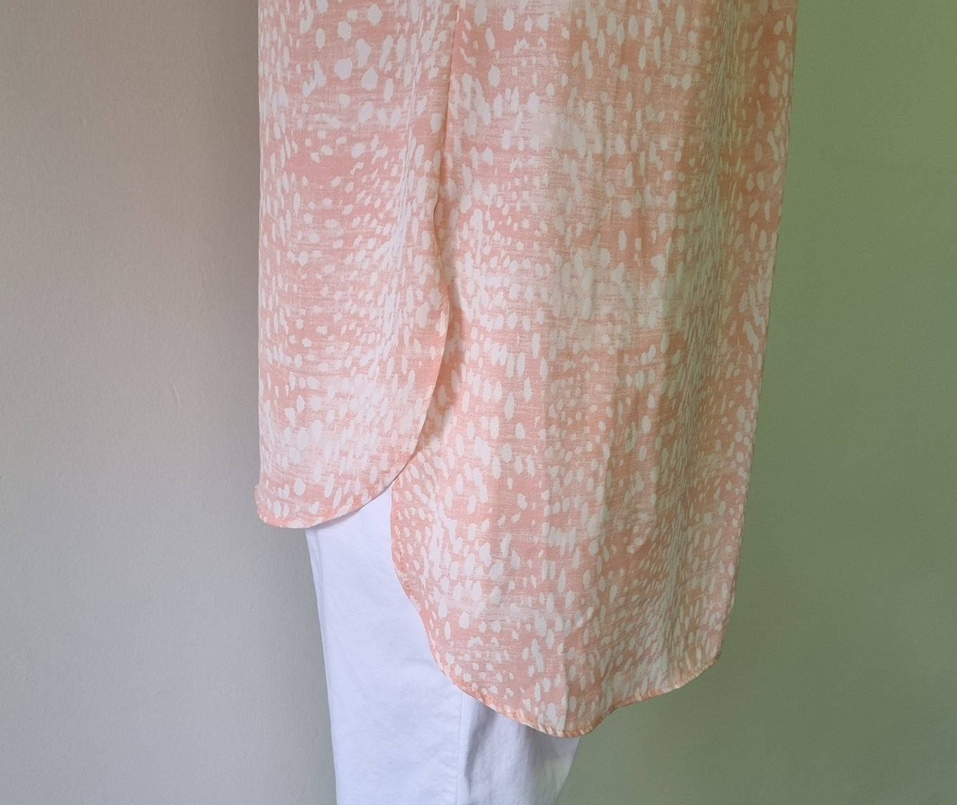 Woolworths - Fresh peach patterned round neckline hi lo sleeveless blouse with front fasterner