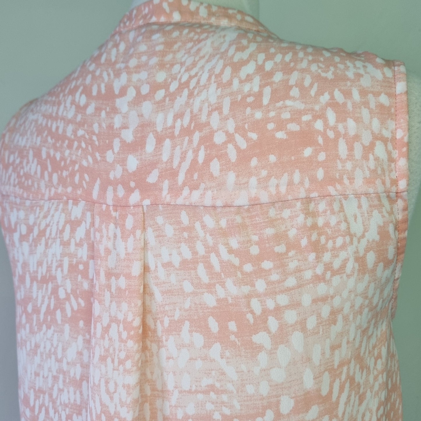 Woolworths - Fresh peach patterned round neckline hi lo sleeveless blouse with front fasterner