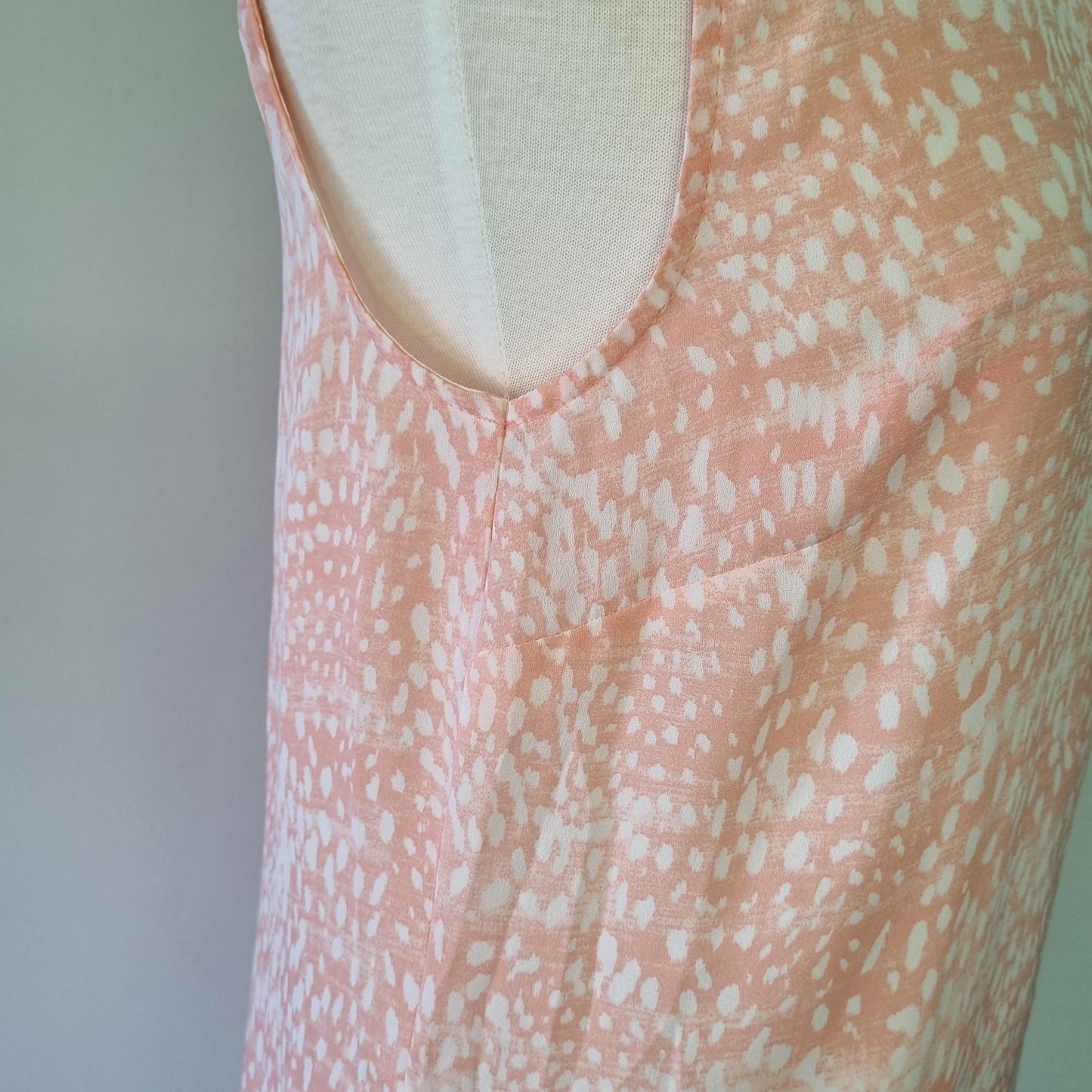 Woolworths - Fresh peach patterned round neckline hi lo sleeveless blouse with front fasterner