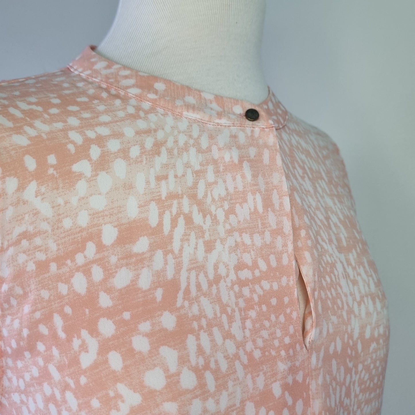Woolworths - Fresh peach patterned round neckline hi lo sleeveless blouse with front fasterner